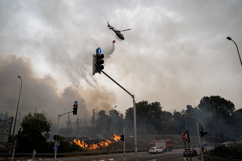AFP__20250501__MEI-Israel-OA-WFII-20250430-023__v1__HighRes__WildfiresInIsrael