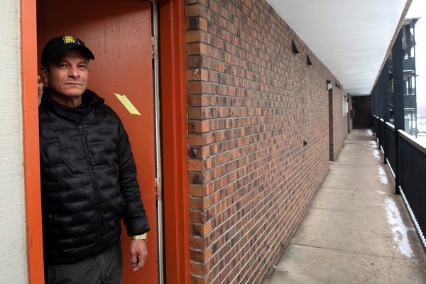 Pablo Morales, a documented Cuban immigrant, poses for a portrait at a friend’s Cedar Run Apartments unit in Denver, Colorado on February 18, 2025. Pablo Morales has nothing against Donald Trump, and when the US president promised mass deportations, he was not worried because as a legal migrant from Cuba, he throught they would only affect criminals. But then immigration officers arrested his son, Luis -- a rideshare driver who has never broken the law and was in the US legally. "He has all his papers, he has his social security number, his work authorization," Morales told AFP, displaying the documents.